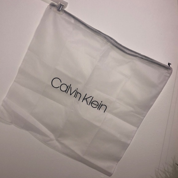Calvin Klein Handbags - Big white purse protecter :)
